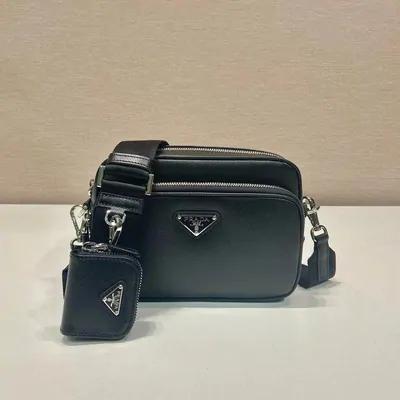 black grained-leather camera bag with a detachable pouch