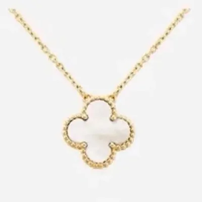 gold clover pendant necklace with a white inlay